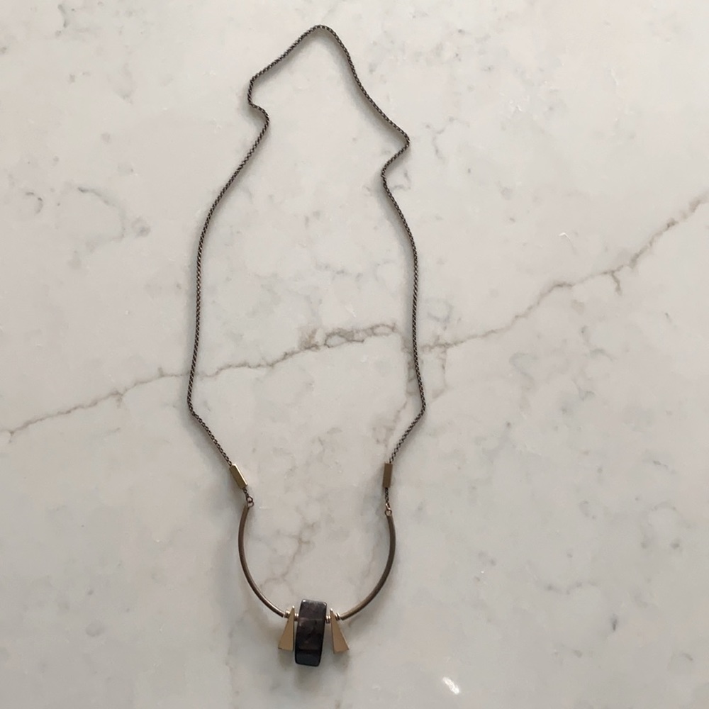 Handmade necklace with a rectangular brown stone.